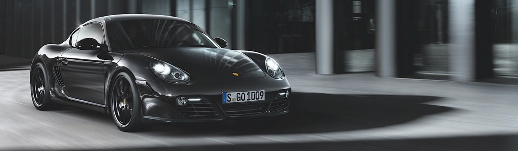 porsche cayman s black edition mj 2011 teaser 1 - Genf 2011: Mini Rocketman sorgt für Aufsehen auf dem Autosalon